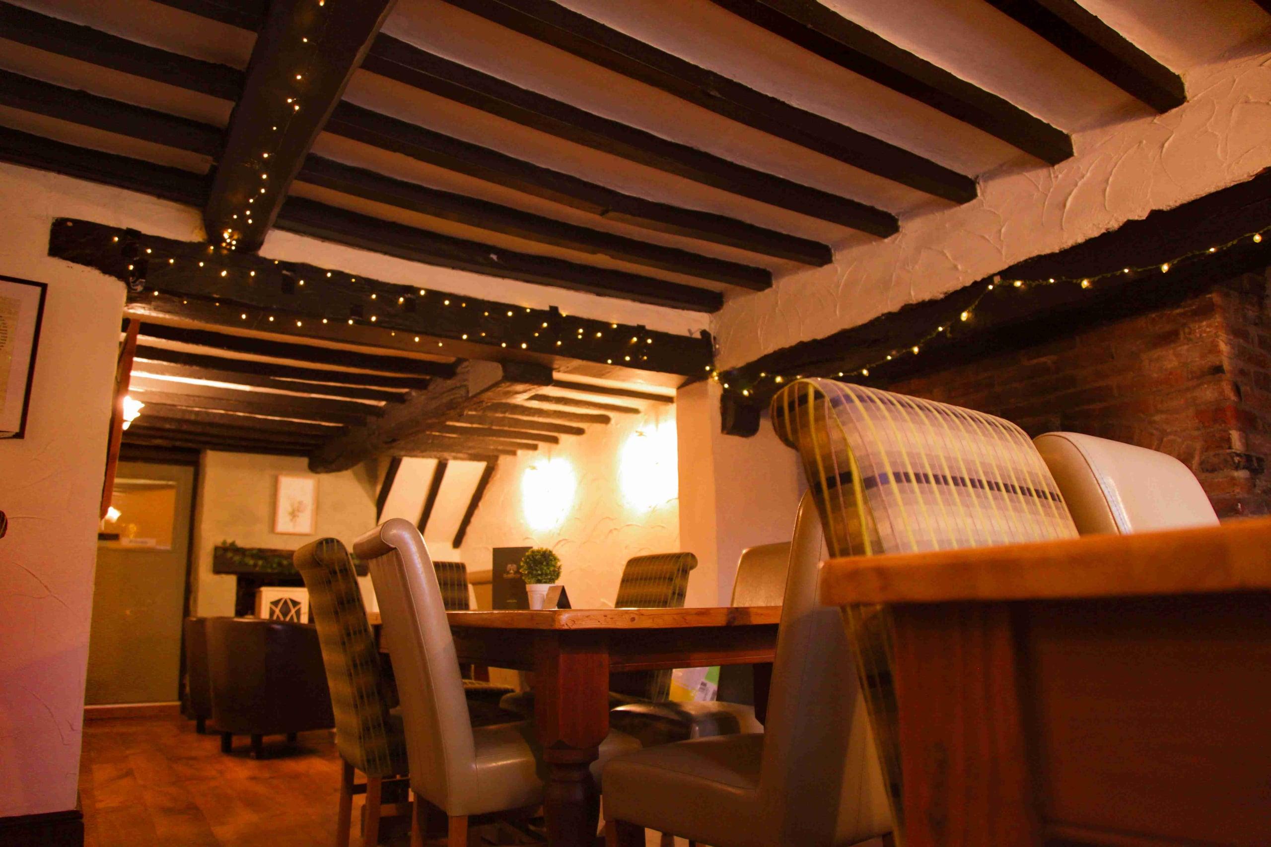 The main dining room set for an evening service.
